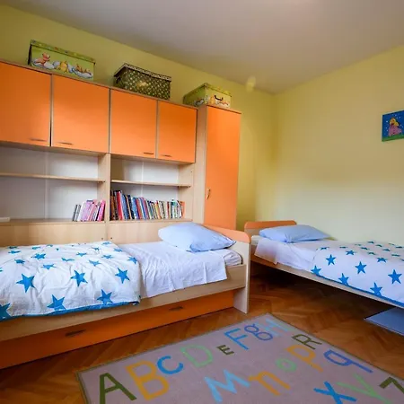 Apartment The Consists Of Two Bedrooms, A Bathroom, A Kitchen And A Living