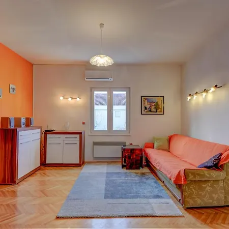 Apartment The Consists Of Two Bedrooms, A Bathroom, A Kitchen And A Living