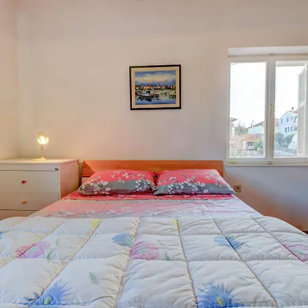 The Consists Of Two Bedrooms, A Bathroom, A Kitchen And A Living Apartament