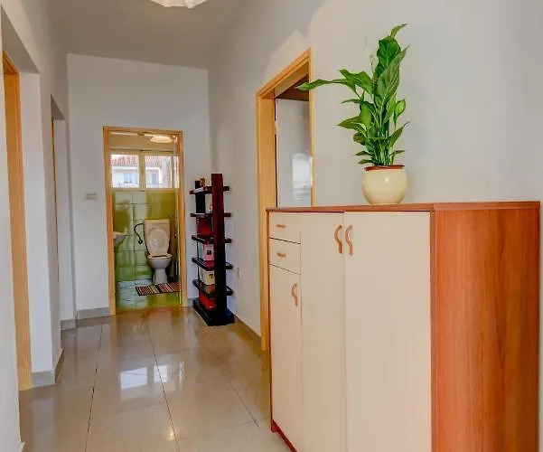 The Consists Of Two Bedrooms, A Bathroom, A Kitchen And A Living Apartament