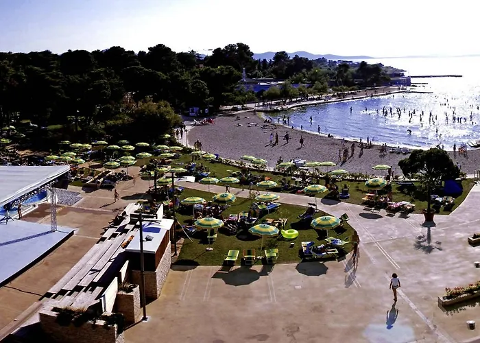 The Consists Of Two Bedrooms, A Bathroom, A Kitchen And A Living