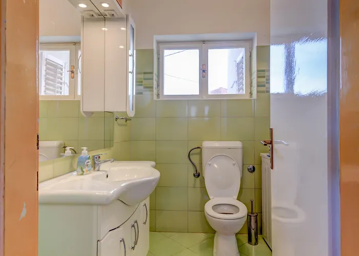 Apartment The Consists Of Two Bedrooms, A Bathroom, A Kitchen And A Living