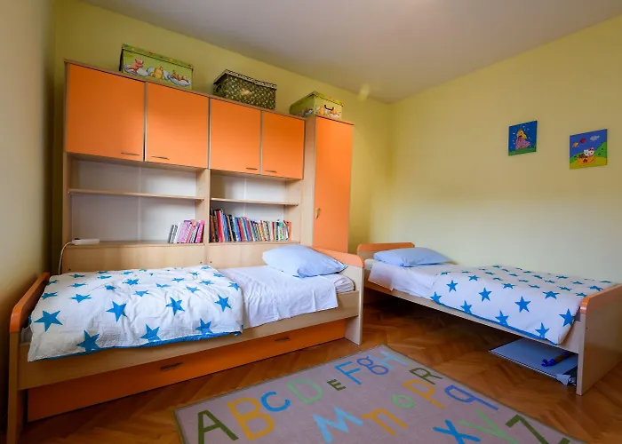 The Consists Of Two Bedrooms, A Bathroom, A Kitchen And A Living Apartament