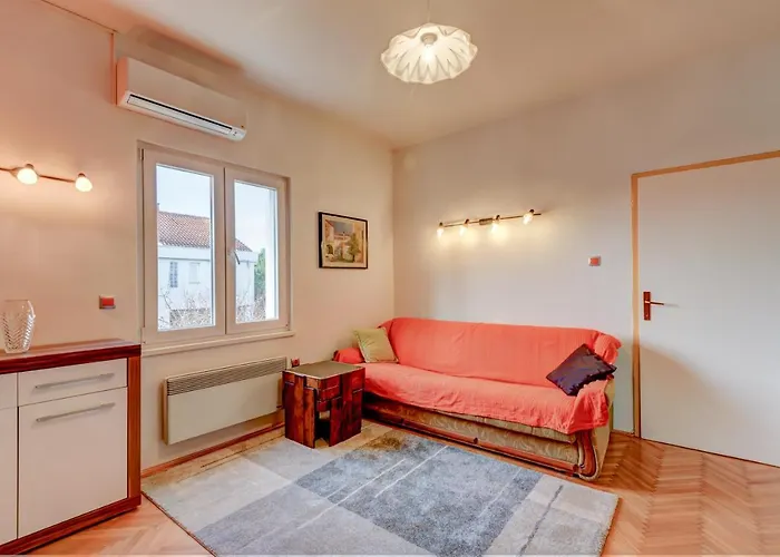 The Consists Of Two Bedrooms, A Bathroom, A Kitchen And A Living Apartament